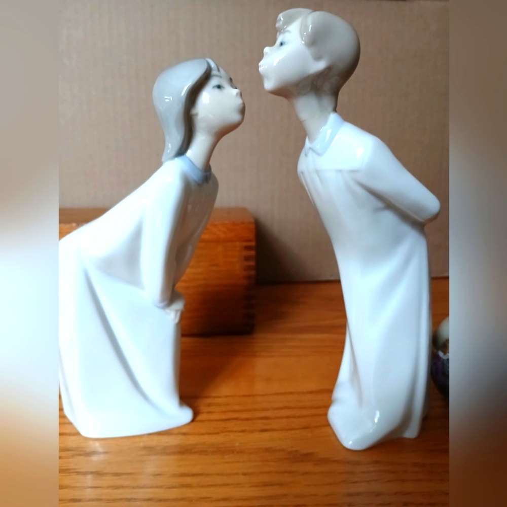 2 Lladro Figurines, Kissing Girl dressed in her nightgown & Boy Blowing …